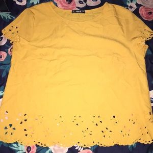gold short sleeve shirt